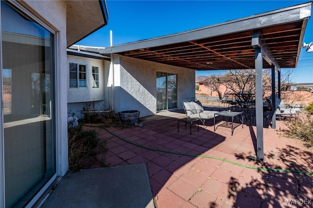 view of patio with outdoor dining area