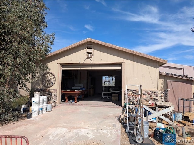 exterior space featuring concrete driveway