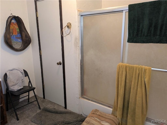 bathroom featuring enclosed tub / shower combo