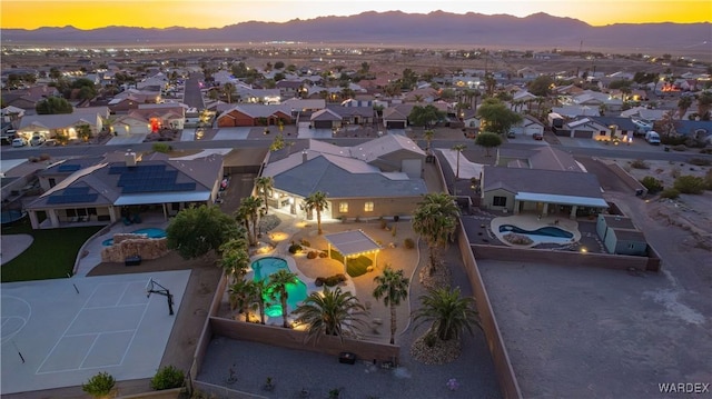 aerial view featuring a residential view and a mountain view