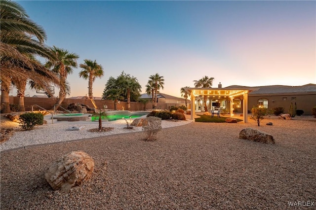 exterior space with a patio area, a fenced backyard, and a fenced in pool