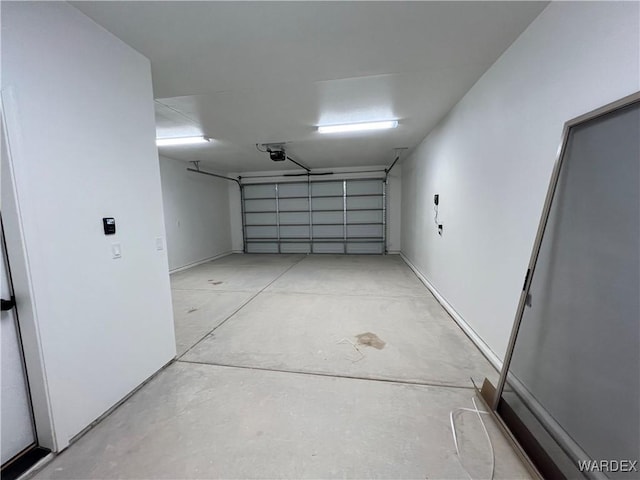 garage featuring a garage door opener