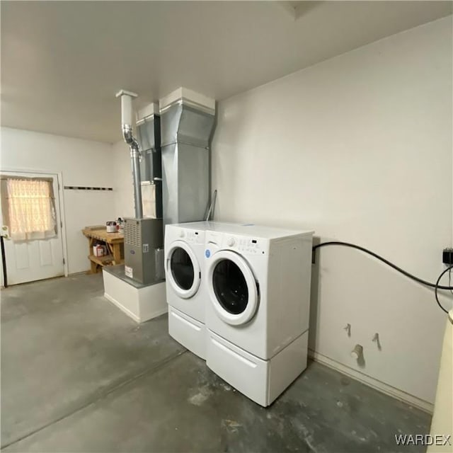 laundry room featuring laundry area and separate washer and dryer