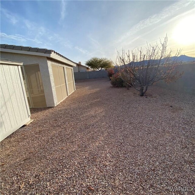 view of yard with a fenced backyard