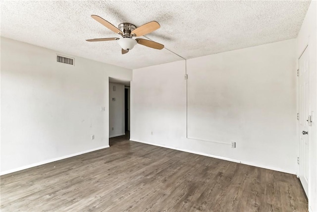 1280 Mohave Dr Unit 28, Bullhead City, AZ 86442 - empty room with ceiling fan, wood finished floors, a textured ceiling, and baseboards