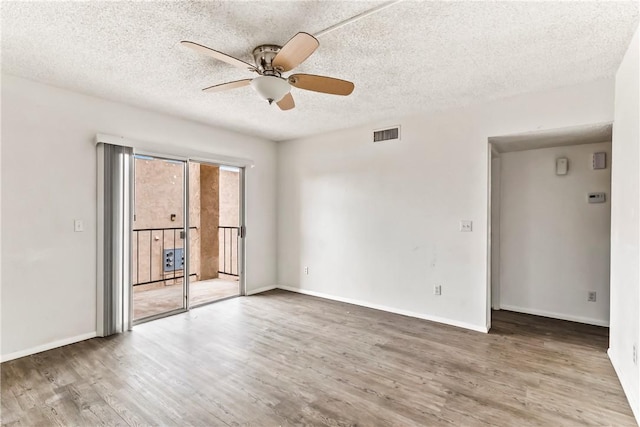 1280 Mohave Dr Unit 28, Bullhead City, AZ 86442 - spare room featuring ceiling fan, wood finished floors, a textured ceiling, and baseboards