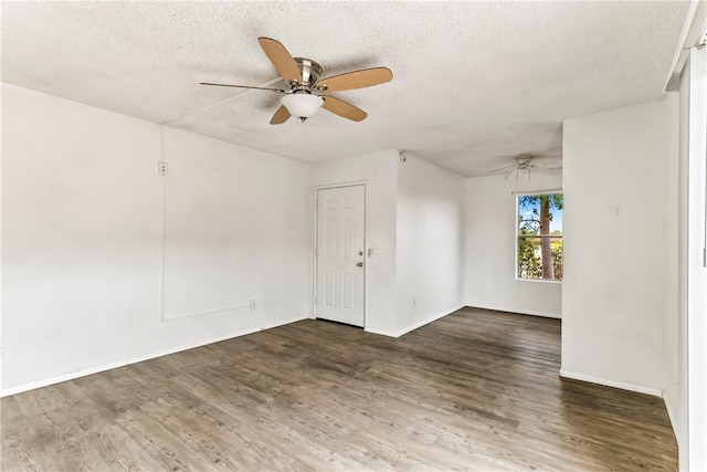 1280 Mohave Dr Unit 28, Bullhead City, AZ 86442 - empty room featuring a ceiling fan, wood finished floors, a textured ceiling, and baseboards