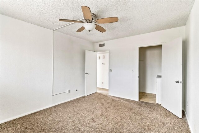 1280 Mohave Dr Unit 28, Bullhead City, AZ 86442 - unfurnished bedroom featuring carpet, a textured ceiling, and a ceiling fan