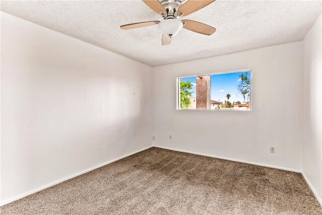 1280 Mohave Dr Unit 28, Bullhead City, AZ 86442 - unfurnished room with carpet, a textured ceiling, baseboards, and a ceiling fan
