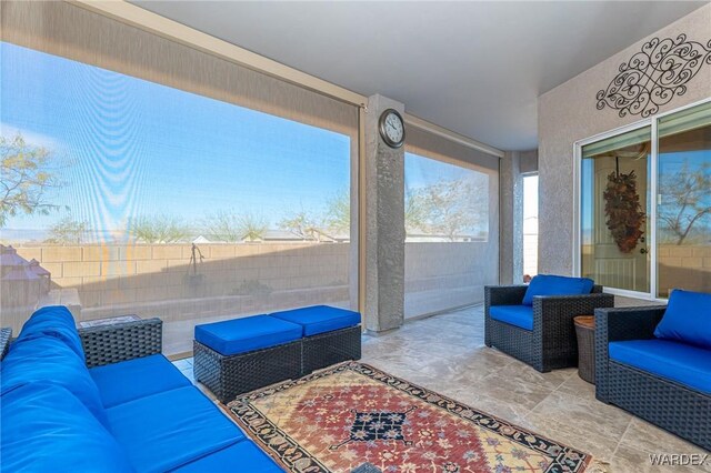 view of patio / terrace with a fenced backyard and an outdoor living space