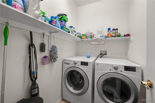 clothes washing area with laundry area and independent washer and dryer