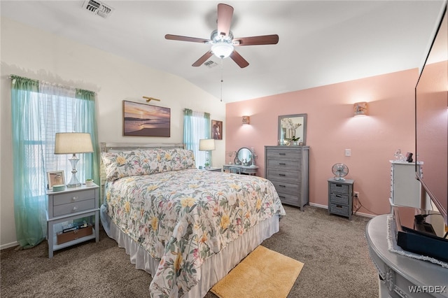 carpeted bedroom with ceiling fan, baseboards, visible vents, and vaulted ceiling