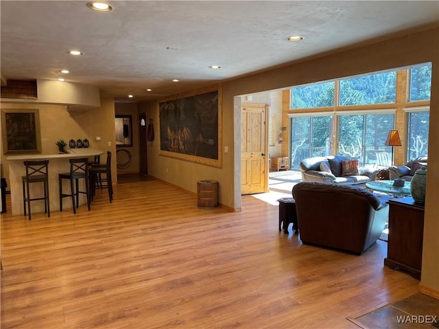 living room featuring recessed lighting and light wood finished floors