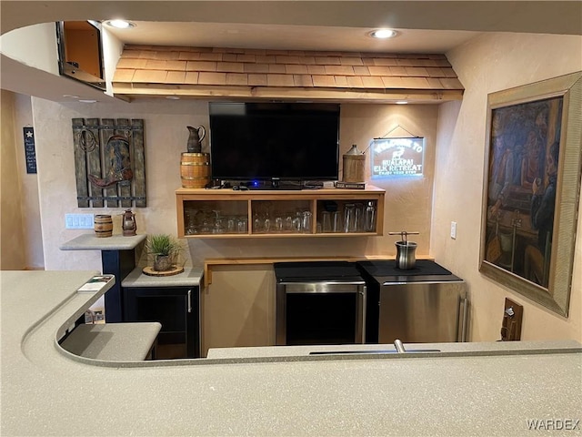 bar featuring recessed lighting and fridge