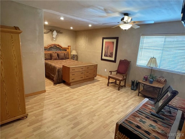 bedroom featuring light wood-type flooring, baseboards, a ceiling fan, and recessed lighting