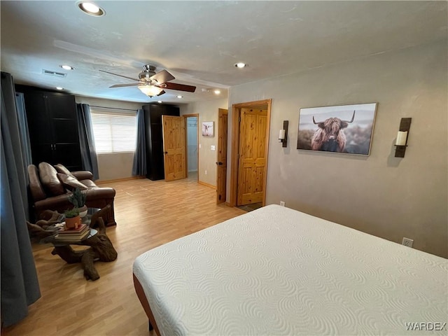 bedroom with recessed lighting, visible vents, and light wood-style flooring