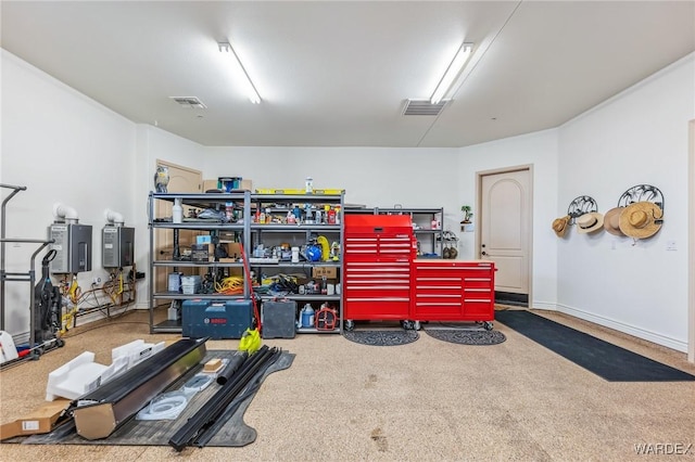 garage featuring visible vents and baseboards