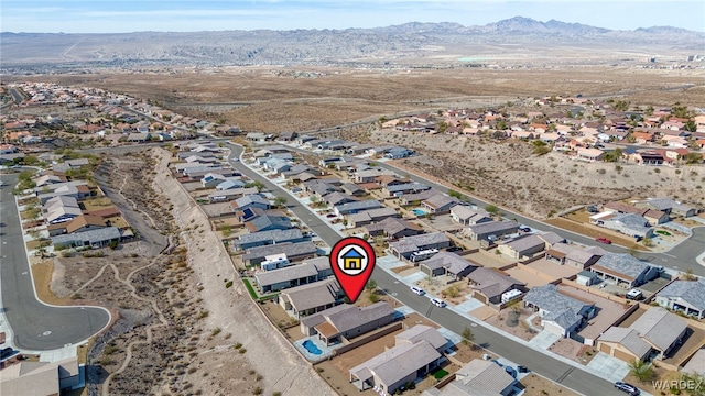 birds eye view of property featuring a residential view and a mountain view