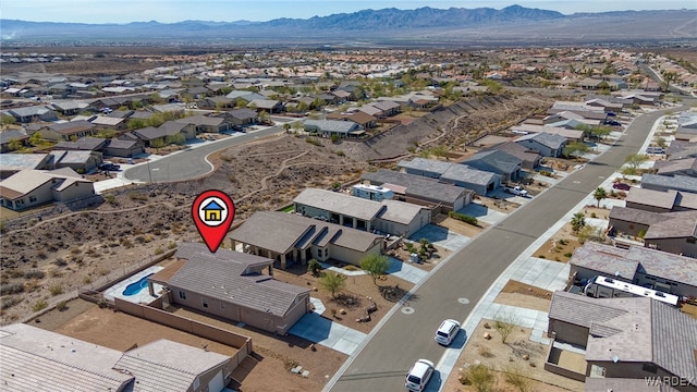 aerial view featuring a residential view and a mountain view