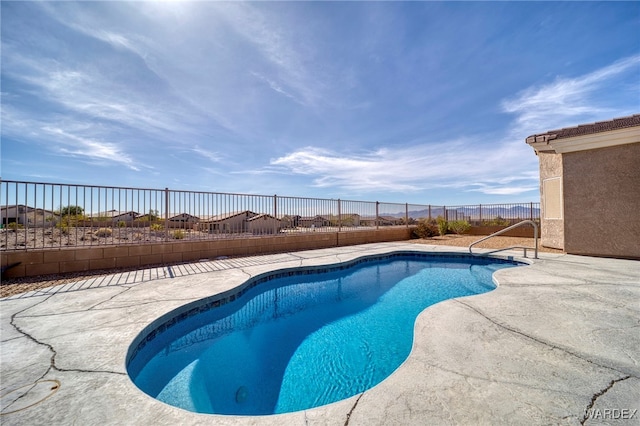 view of pool with a patio area, a fenced backyard, and a fenced in pool