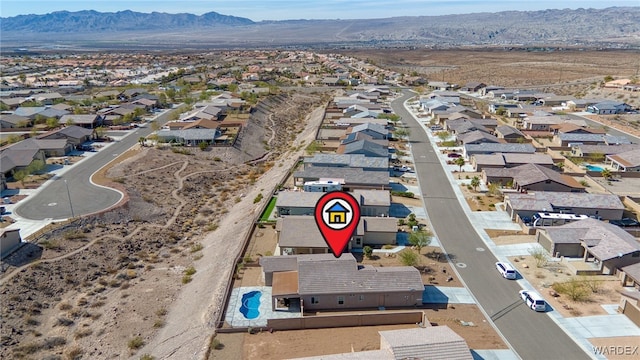 aerial view featuring a residential view and a mountain view