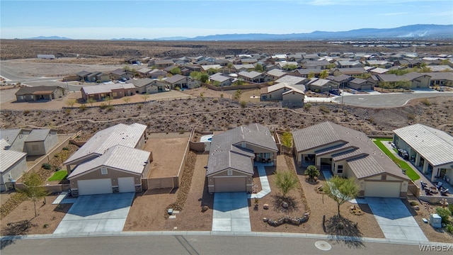 aerial view with a residential view and a mountain view