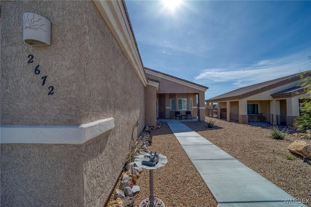 view of home's exterior featuring a patio and stucco siding