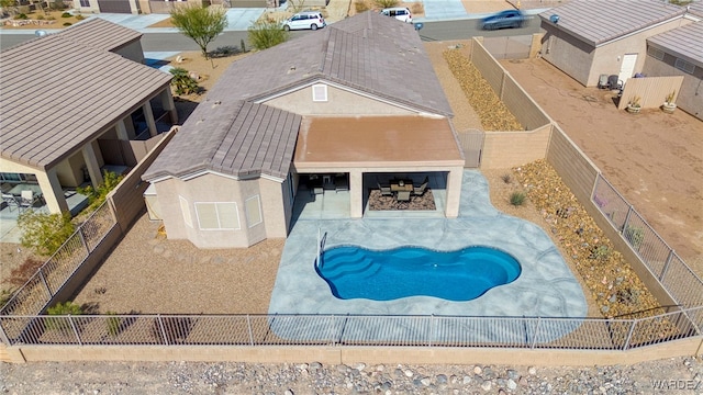 view of pool featuring a fenced in pool and a fenced backyard