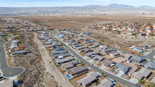 drone / aerial view with a residential view and a mountain view