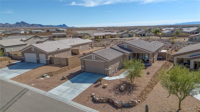 aerial view featuring a mountain view and a residential view