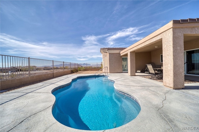 view of pool featuring a fenced in pool, a fenced backyard, and a patio