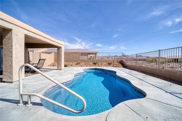 view of swimming pool with a fenced in pool, a patio area, and a fenced backyard