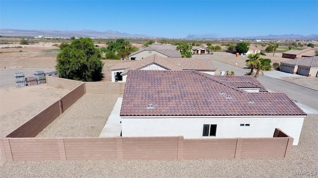 birds eye view of property featuring a residential view and a mountain view