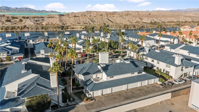 drone / aerial view with a residential view and a mountain view