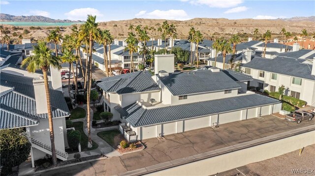 bird's eye view featuring a residential view and a mountain view