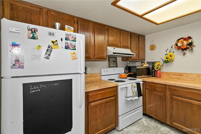 kitchen with brown cabinetry, white appliances, butcher block counters, and under cabinet range hood