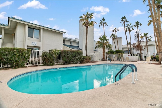 community pool with fence