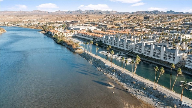 bird's eye view featuring a residential view and a water and mountain view