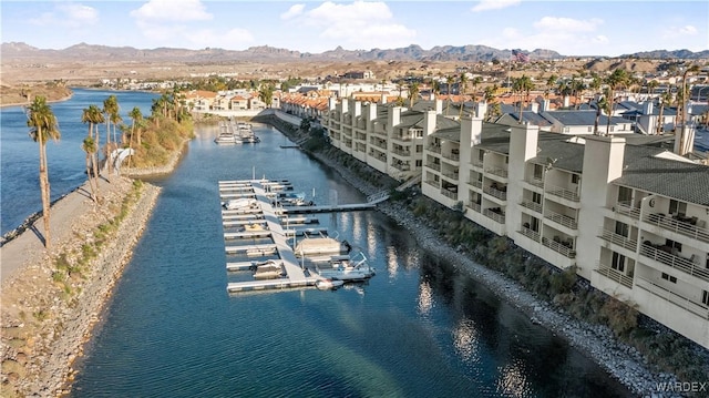 birds eye view of property featuring a residential view and a water and mountain view