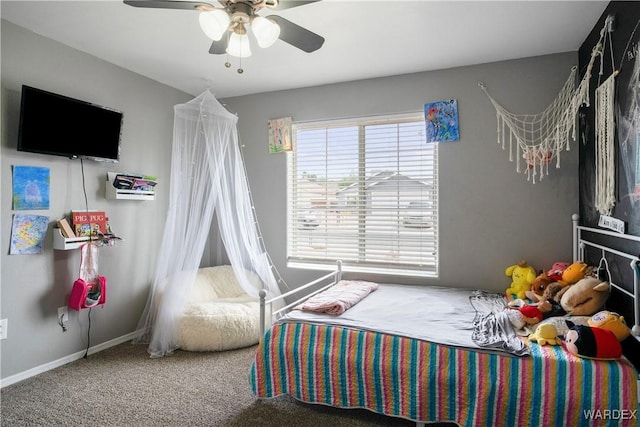 bedroom with baseboards, carpet, and ceiling fan