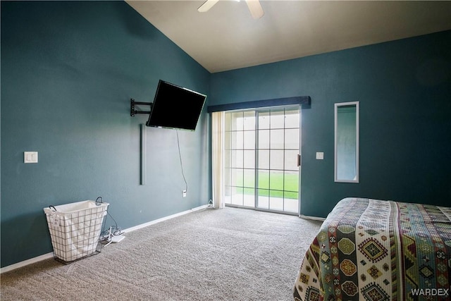 bedroom featuring carpet flooring, a ceiling fan, baseboards, and vaulted ceiling