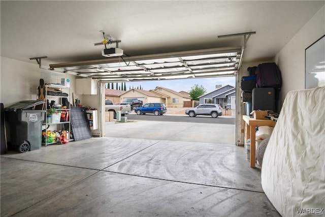 garage featuring a garage door opener