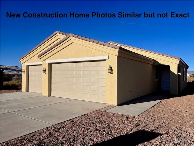 exterior space featuring concrete driveway