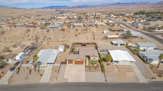 birds eye view of property featuring a residential view and a mountain view