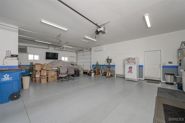 garage with a garage door opener and an AC wall unit