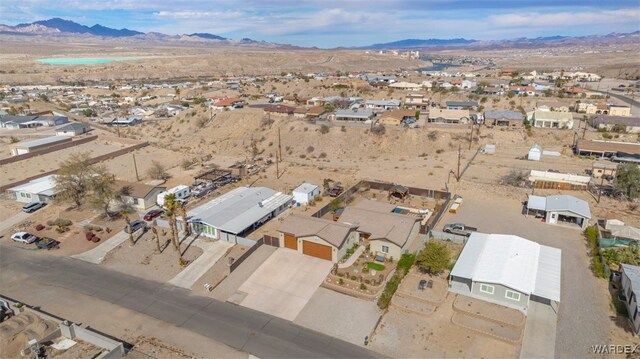 birds eye view of property with a residential view and a mountain view