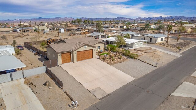 bird's eye view featuring a residential view and a mountain view