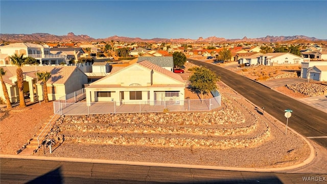 bird's eye view featuring a residential view and a mountain view