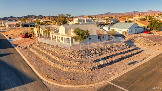 aerial view with a mountain view and a residential view