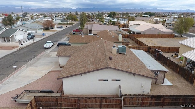 bird's eye view featuring a residential view and a mountain view